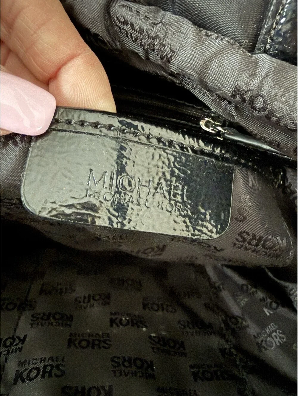 Michael Kors measures 15”